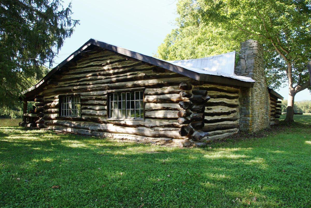 The 19th-century log home moved for a newer farmhouse