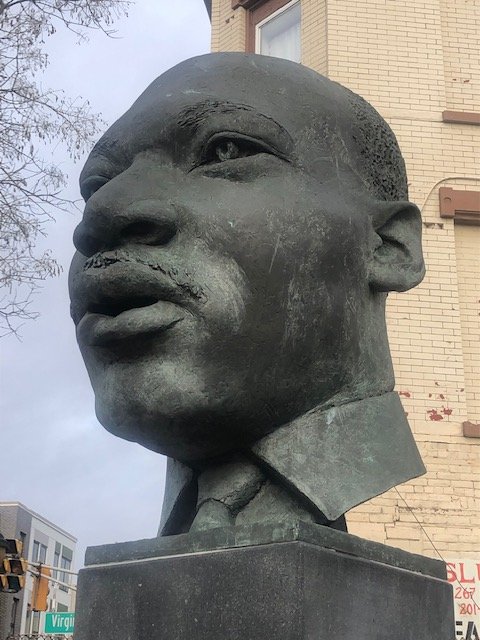 Silent Standoff: Martin Luther King Jr's Bronze Gaze in Jersey City
